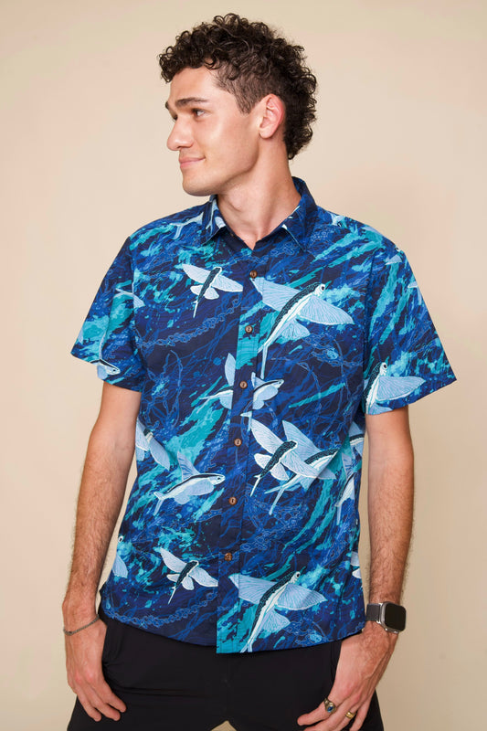 Man wears Mens Business Casual Blue Aloha Shirt