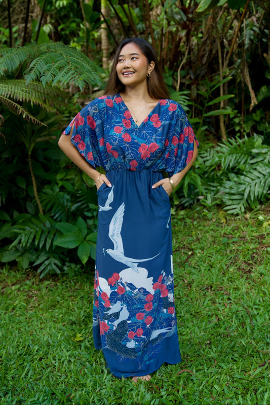 formal hawaiian dresses Fortunate One Enjoy the heat and the sand whilst dancing in Hawai whilst wearing the Hawaiian Party Maxi Dress in Blue Hawaiian Print Dresses David